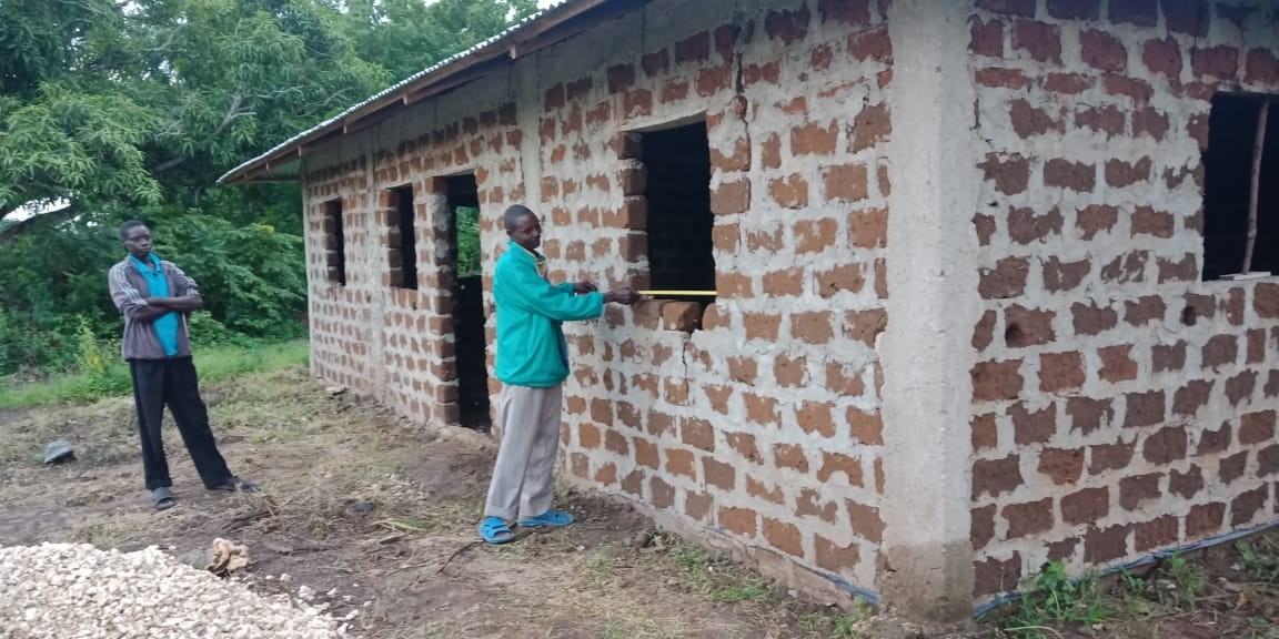 Jane Wambui,receives a house