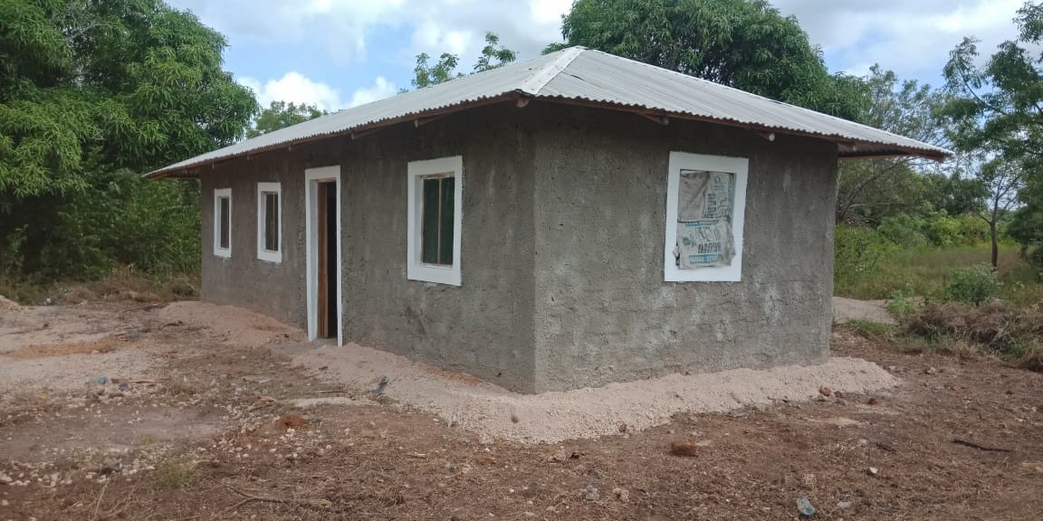 Jane Wambui,receives a house